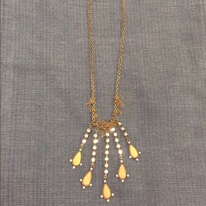 Necklace with dangling jewels